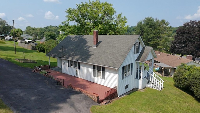 419 Adams St, Marion, VA 24354 - view of property exterior with a chimney, stairs, a shingled roof, and a lawn
