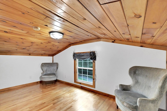 unfurnished room featuring light hardwood / wood-style floors, lofted ceiling, and wood ceiling