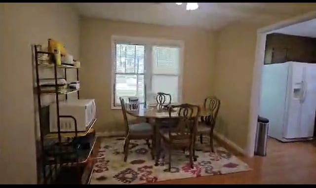 1022 Dry Tripe Rd, Grundy, VA 24614 - dining room with baseboards and wood finished floors
