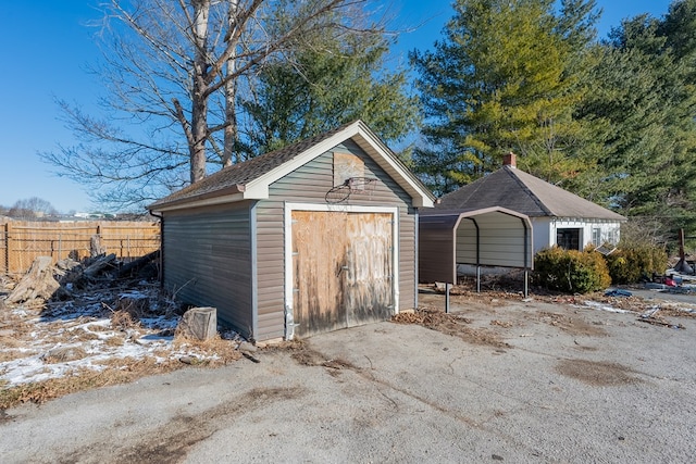 view of outbuilding with a carport