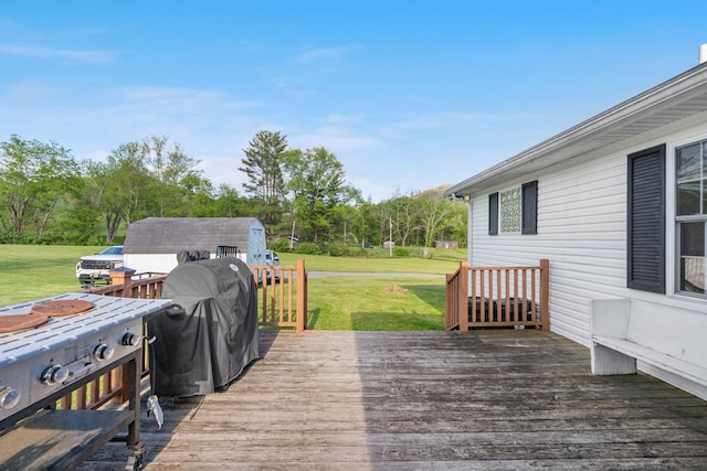 3003 Freestone Valley Rd, Tannersville, VA 24377 - deck featuring a yard, view of wooded area, and grilling area