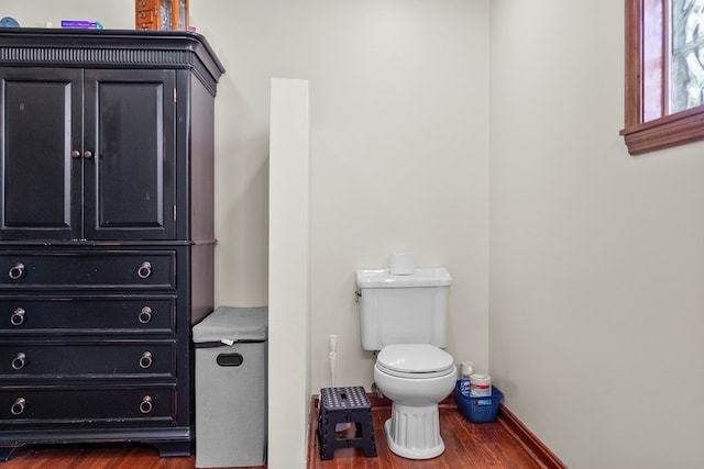 3003 Freestone Valley Rd, Tannersville, VA 24377 - bathroom with wood finished floors, toilet, and baseboards