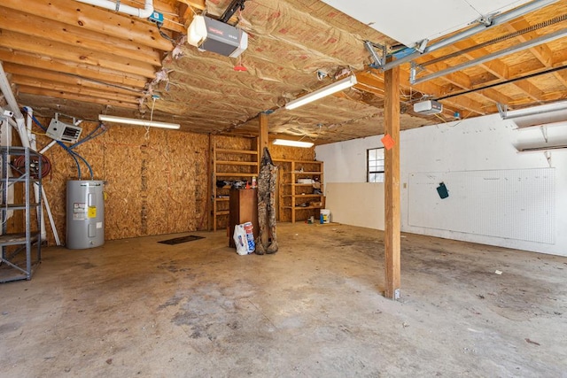 garage featuring water heater and a garage door opener