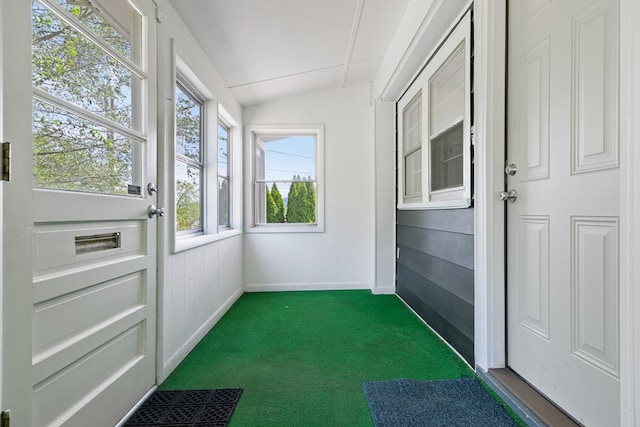 unfurnished sunroom with vaulted ceiling