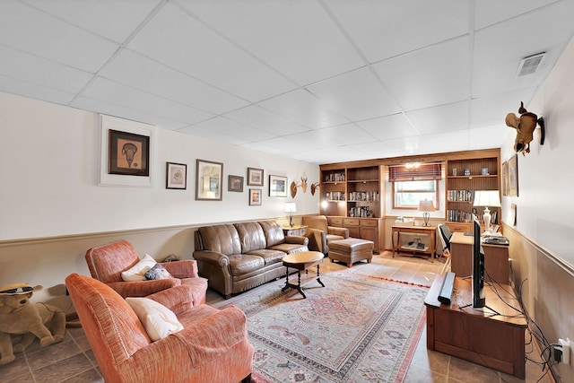 1103 Panorama Dr, Abingdon, VA 24210 - living area with a paneled ceiling, built in features, and light tile patterned flooring