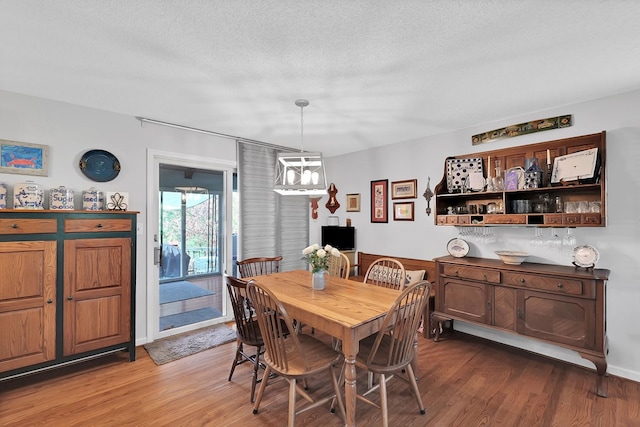 1103 Panorama Dr, Abingdon, VA 24210 - dining room with wood finished floors and a textured ceiling