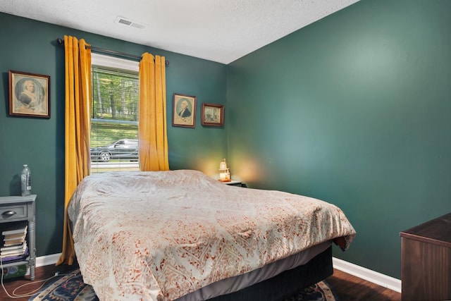156 Ridgecrest St, Bluefield, VA 24605 - bedroom with dark wood finished floors and baseboards