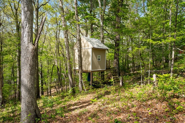 156 Ridgecrest St, Bluefield, VA 24605 - view of outdoor structure featuring a wooded view
