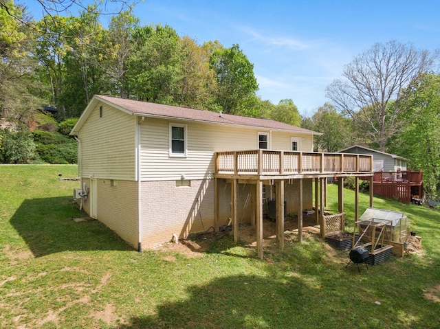 156 Ridgecrest St, Bluefield, VA 24605 - back of house with a wooden deck, a lawn, and view of scattered trees