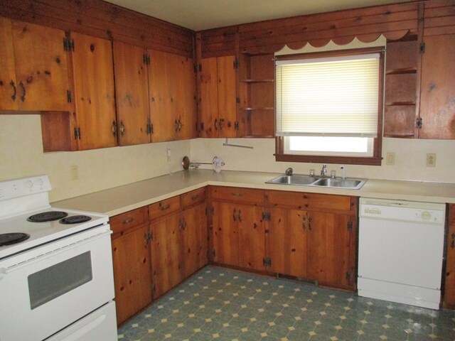 kitchen with light countertops, white appliances, tile patterned floors, a sink, and open shelves