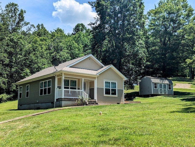 1251 Epperly Mill Rd, Floyd, VA 24091 - view of front of home featuring crawl space, covered porch, a storage shed, and a front yard