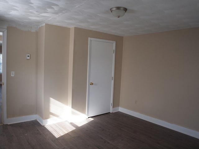 513 Adwolfe Rd, Marion, VA 24354 - unfurnished room with dark wood finished floors and baseboards