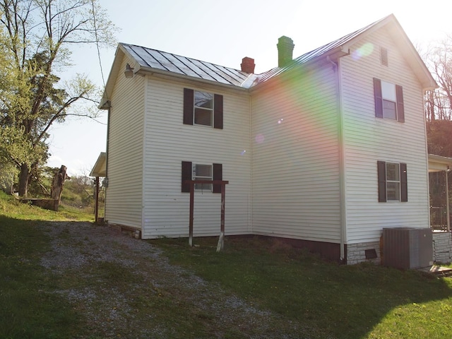 513 Adwolfe Rd, Marion, VA 24354 - view of side of home featuring a standing seam roof, a chimney, and a metal roof