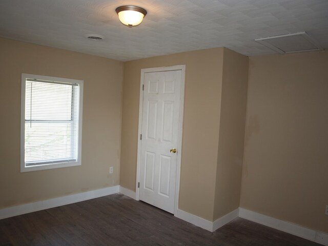 513 Adwolfe Rd, Marion, VA 24354 - unfurnished room with dark wood-style floors and baseboards