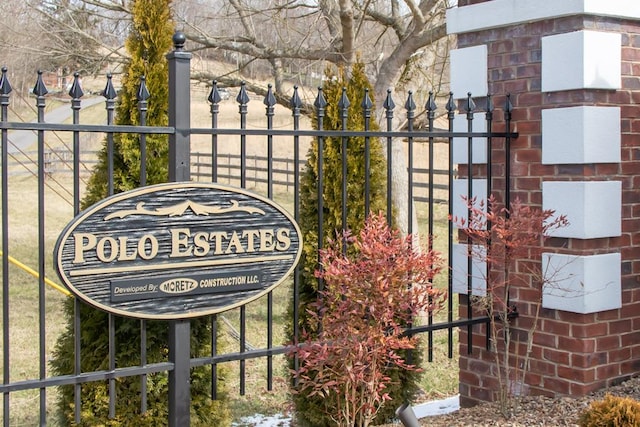 view of gate featuring fence