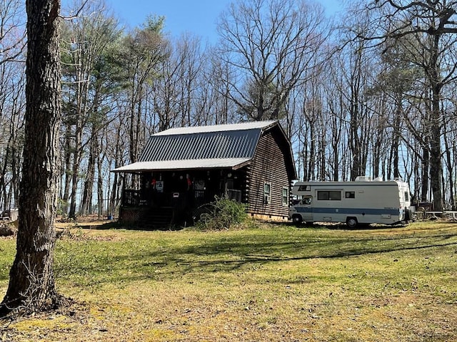 exterior space featuring an outbuilding and a barn