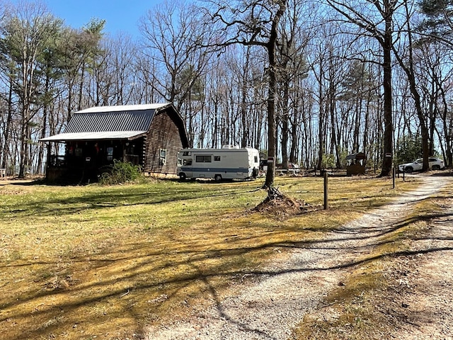 exterior space with a barn and an outdoor structure