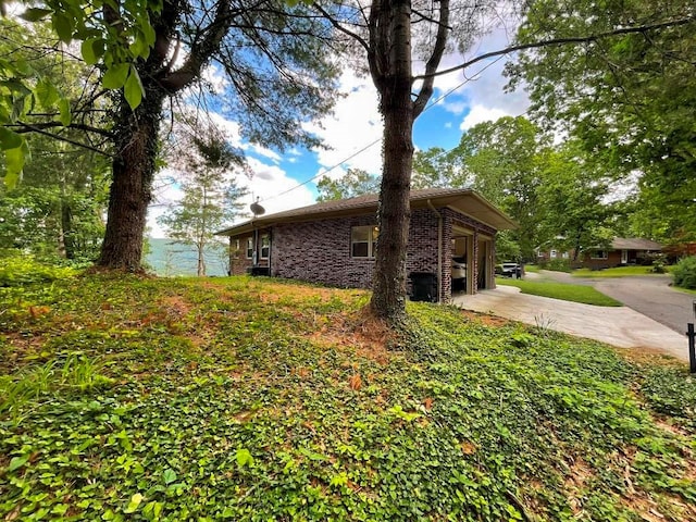 675 Pine Ridge Rd, Wytheville, VA 24382 - view of side of home with driveway and brick siding