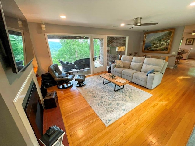 675 Pine Ridge Rd, Wytheville, VA 24382 - living room featuring a fireplace, ceiling fan, plenty of natural light, wood finished floors, and recessed lighting