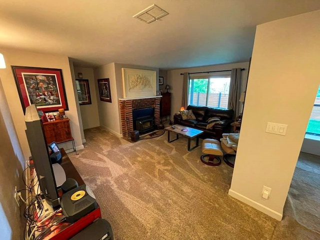 675 Pine Ridge Rd, Wytheville, VA 24382 - living room with carpet floors and a wood stove