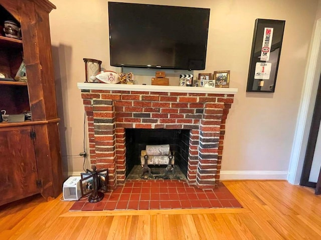 675 Pine Ridge Rd, Wytheville, VA 24382 - detailed view of wood finished floors and a brick fireplace