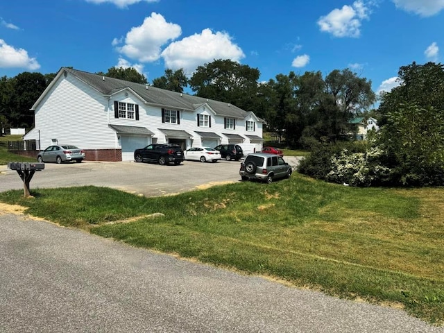 exterior space featuring a front lawn