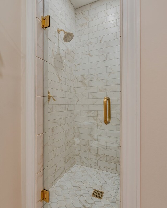 bathroom with a stall shower