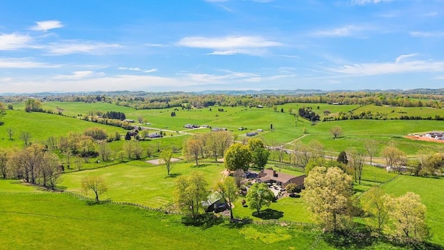 birds eye view of property featuring a rural view
