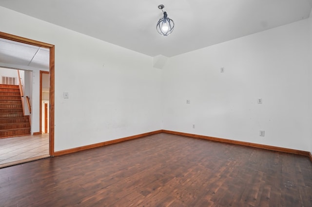 271 Burgan Rd, Pennington Gap, VA 24277 - spare room featuring wood finished floors, stairway, and baseboards