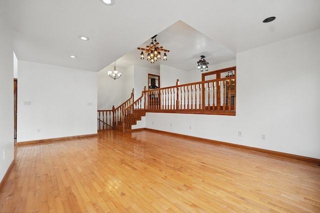 271 Burgan Rd, Pennington Gap, VA 24277 - unfurnished living room with a chandelier, light wood finished floors, stairs, baseboards, and recessed lighting