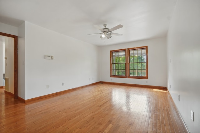 271 Burgan Rd, Pennington Gap, VA 24277 - spare room featuring a ceiling fan, light wood finished floors, and baseboards