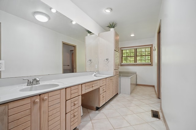271 Burgan Rd, Pennington Gap, VA 24277 - bathroom featuring a bath, double vanity, tile patterned flooring, baseboards, and recessed lighting