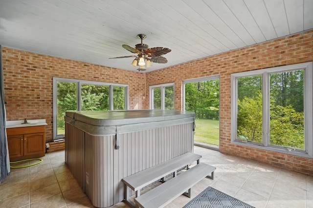 271 Burgan Rd, Pennington Gap, VA 24277 - sunroom / solarium with a jacuzzi and a ceiling fan