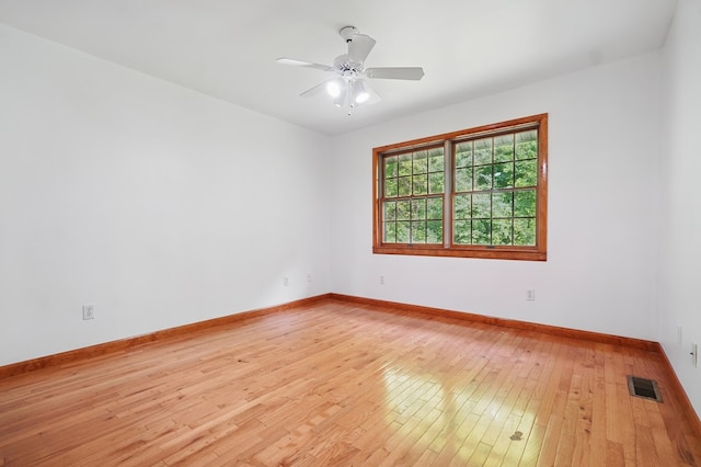 271 Burgan Rd, Pennington Gap, VA 24277 - spare room with light wood finished floors, baseboards, and a ceiling fan