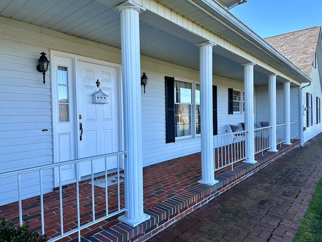 property entrance with a porch