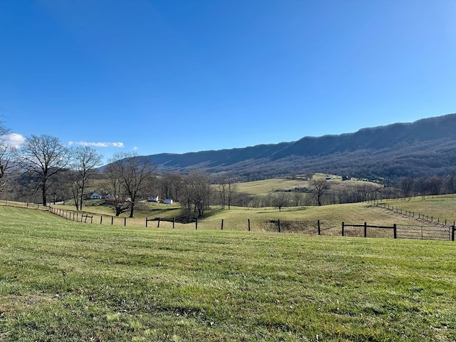 mountain view featuring a rural view