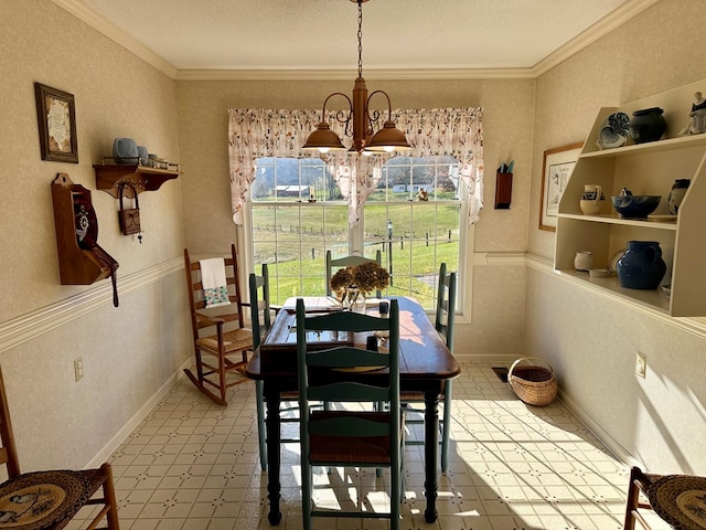 dining room featuring crown molding, a textured ceiling, and a chandelier