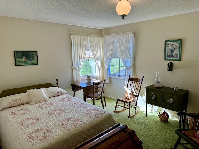 carpeted bedroom with a textured ceiling