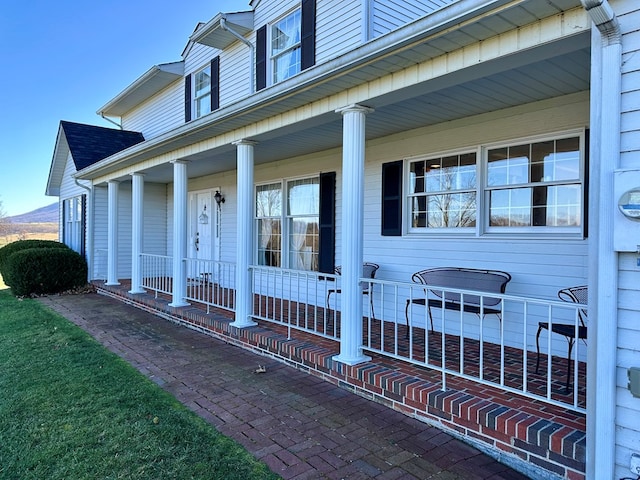 entrance to property featuring covered porch