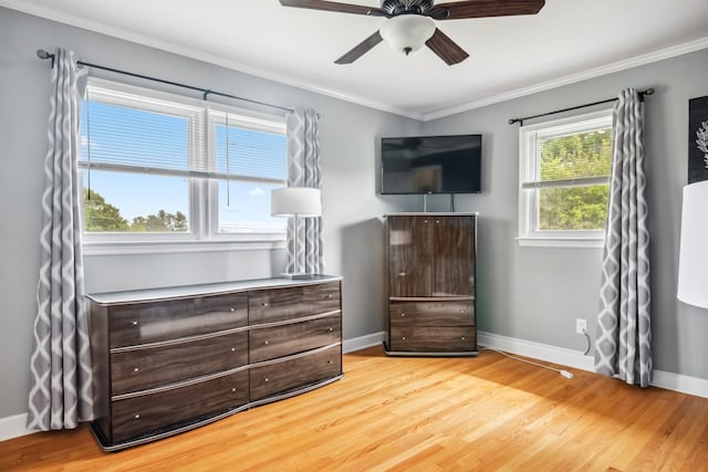 411 Courtland Cir, Galax, VA 24333 - bedroom featuring wood finished floors, ornamental molding, baseboards, and a ceiling fan