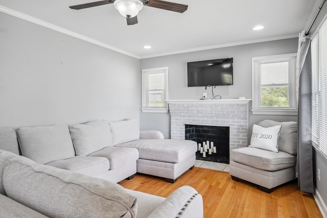 411 Courtland Cir, Galax, VA 24333 - living room with ceiling fan, wood finished floors, a fireplace, recessed lighting, and ornamental molding