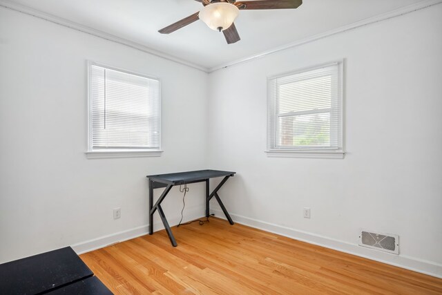 411 Courtland Cir, Galax, VA 24333 - unfurnished room with light wood-type flooring, a ceiling fan, baseboards, and ornamental molding