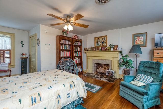 210 Valley St NE, Abingdon, VA 24210 - bedroom featuring hardwood / wood-style floors and a tile fireplace