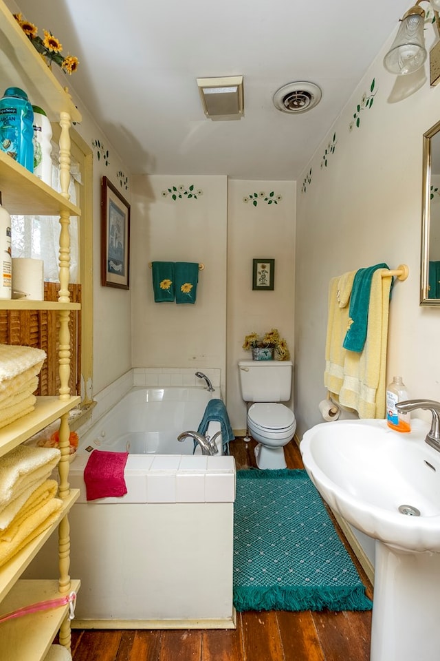 210 Valley St NE, Abingdon, VA 24210 - full bath with wood finished floors and a bath