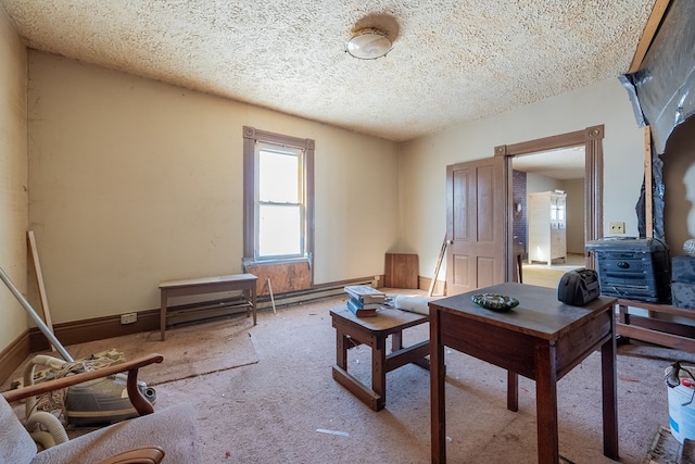 carpeted living room featuring a textured ceiling