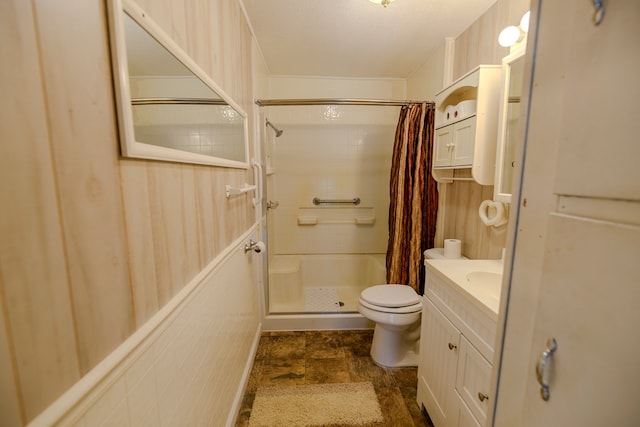 bathroom with vanity, toilet, and walk in shower