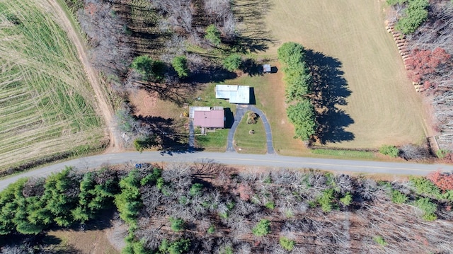 birds eye view of property featuring a rural view