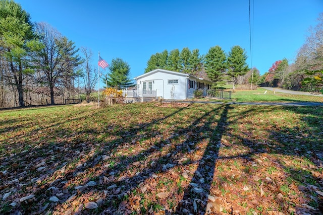 view of yard with a deck