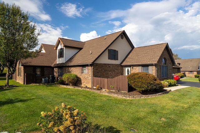 18959 Middle Dr, Abingdon, VA 24211 - view of side of home featuring brick siding and roof with shingles