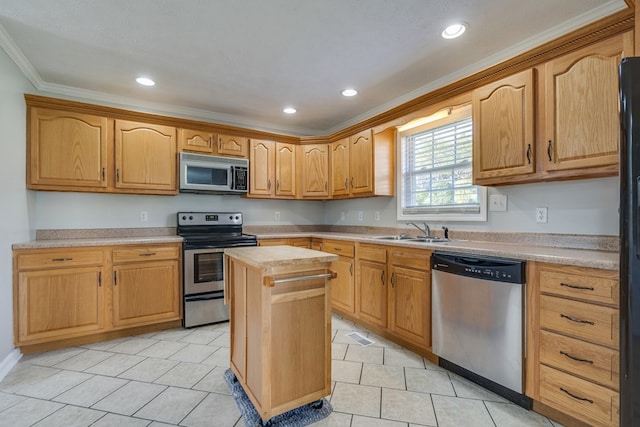 467 Thru Dr, Pounding Mill, VA 24637 - kitchen featuring appliances with stainless steel finishes, ornamental molding, recessed lighting, light tile patterned floors, and a kitchen island